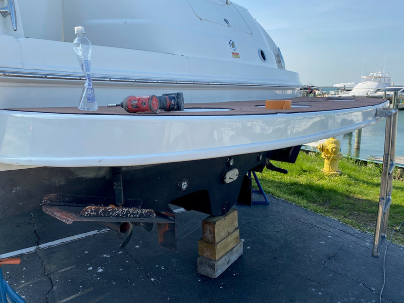 Hull side repair ground and faired below the rub rail