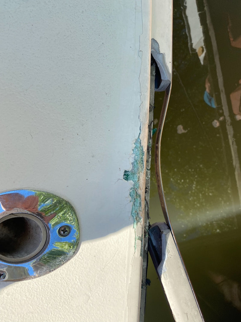 Chipped fiberglass edge beside a chrome fitting